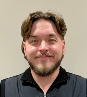 Staff member Mason Whitcomb from ID_ce35afa8686a