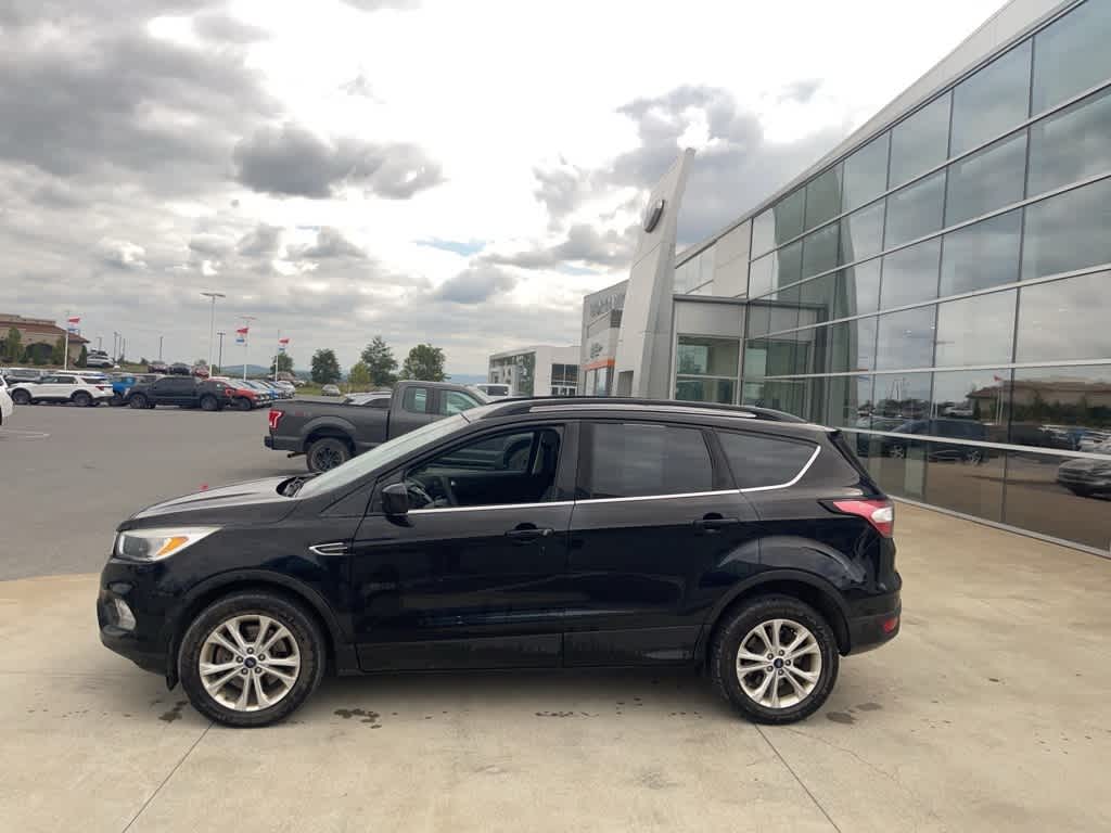 Used 2018 Ford Escape SE with VIN 1FMCU9GD2JUA51231 for sale in Morgantown, WV