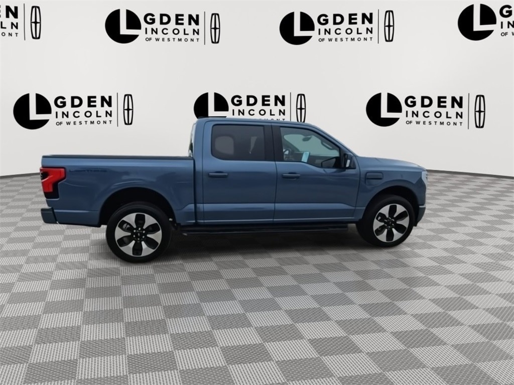 Used 2023 Ford F-150 Lightning Platinum with VIN 1FT6W1EV4PWG40013 for sale in Westmont, IL