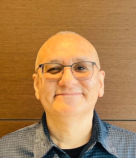 Staff member Eduardo Reyes from ID_b0c3493bd092