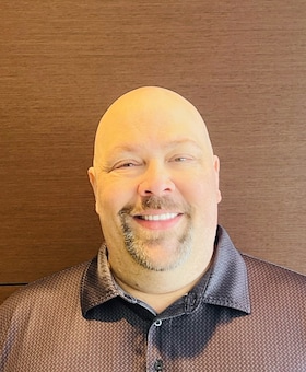 Staff member Eric Drew from ID_b0c3493bd092