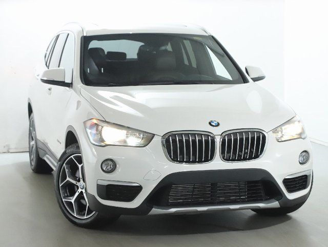Used 2018 BMW X1 28i with VIN WBXHT3C33J5L24889 for sale in Solon, OH