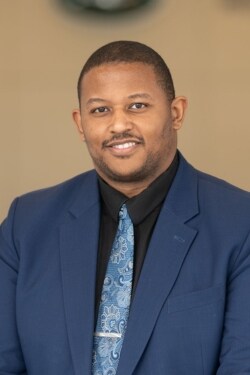 Staff member Andrew Reid from ID_c3f920