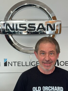 Staff member Mik Kooi from 894c2f091e10