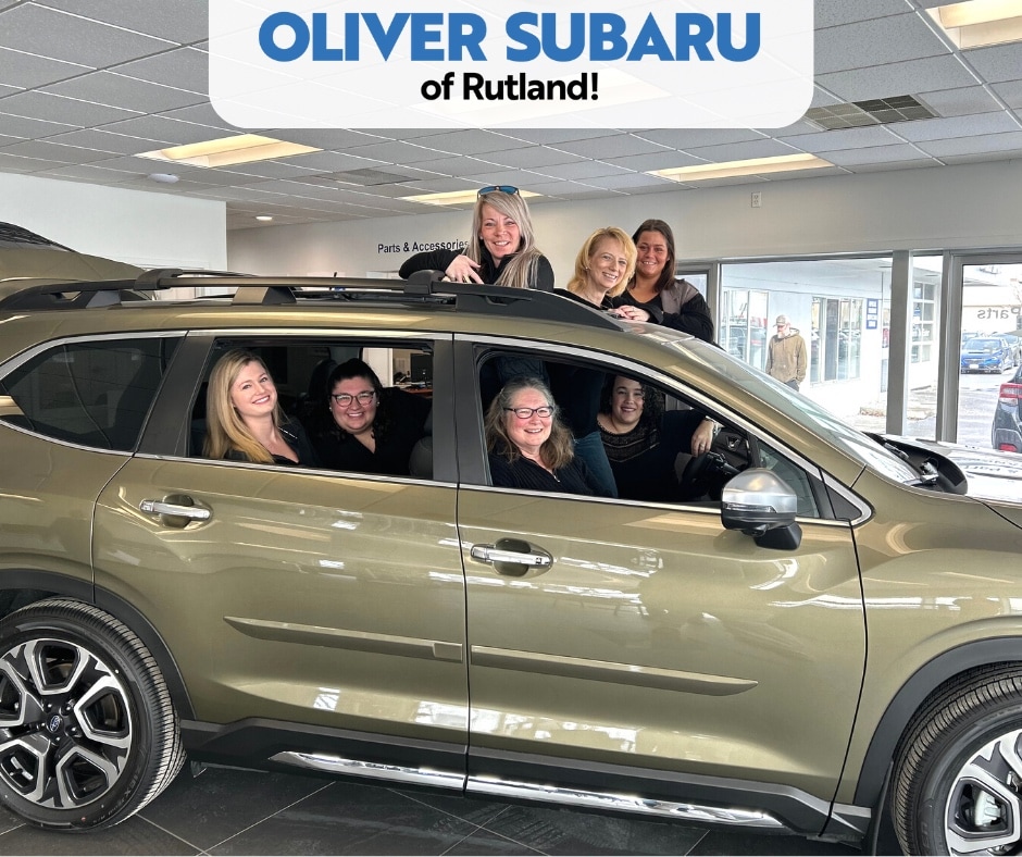  Person cheerfully signing documents.