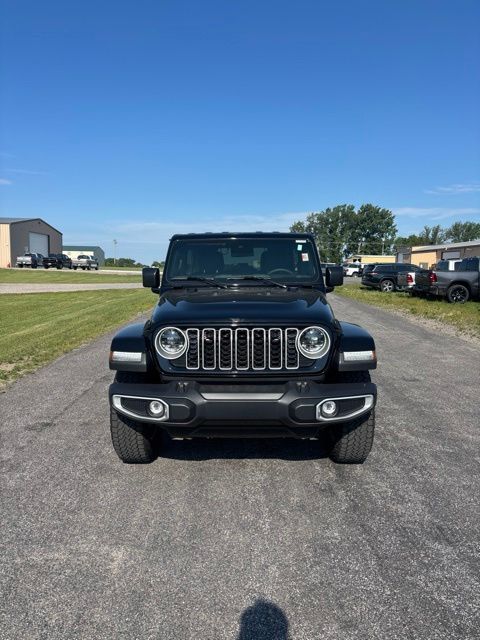 Used 2024 Jeep Wrangler 4-Door Sahara with VIN 1C4PJXEGXRW336422 for sale in Olivia, Minnesota