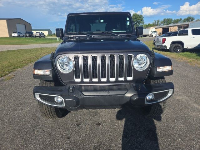 Used 2021 Jeep Wrangler Unlimited Sahara with VIN 1C4HJXEM5MW584418 for sale in Olivia, Minnesota