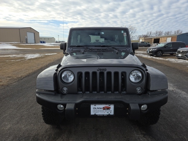 Used 2018 Jeep Wrangler JK Unlimited Freedom Edition with VIN 1C4BJWDG7JL847520 for sale in Olivia, Minnesota