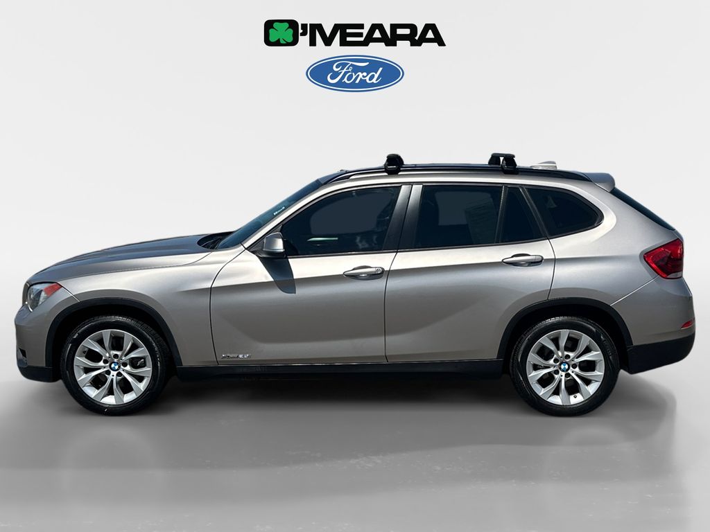 Used 2014 BMW X1 28i with VIN WBAVL1C56EVY17376 for sale in Northglenn, CO