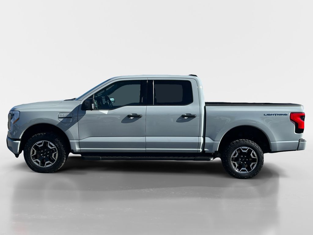 Used 2023 Ford F-150 Lightning XLT with VIN 1FTVW1EL7PWG20090 for sale in Northglenn, CO