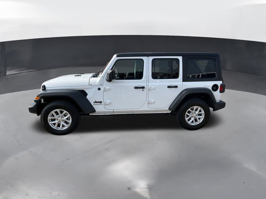 Used 2023 Jeep Wrangler 4-Door Sport S with VIN 1C4HJXDNXPW697991 for sale in Thornton, CO