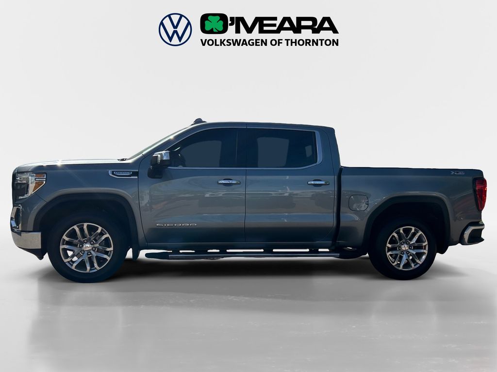 Used 2021 GMC Sierra 1500 SLT with VIN 1GTU9DED1MZ120501 for sale in Thornton, CO