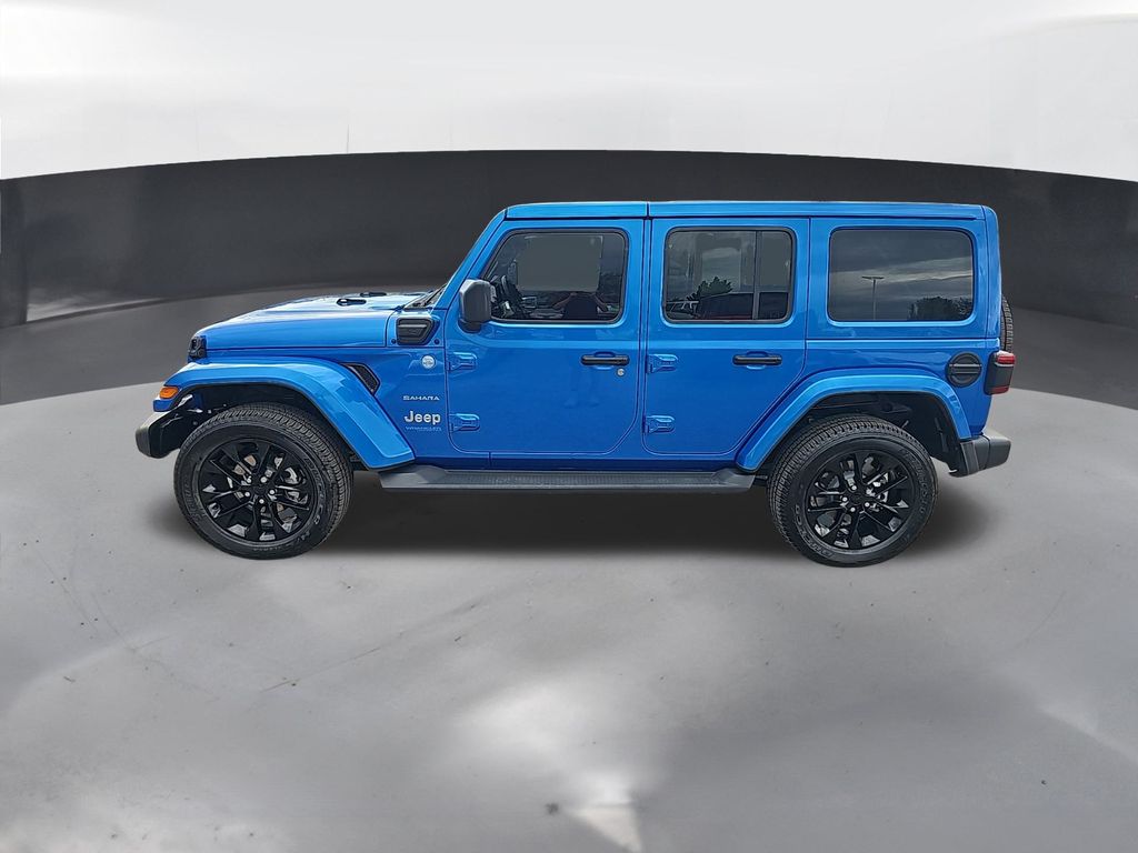 Used 2021 Jeep Wrangler Unlimited Sahara 4XE with VIN 1C4JJXP63MW675722 for sale in Thornton, CO