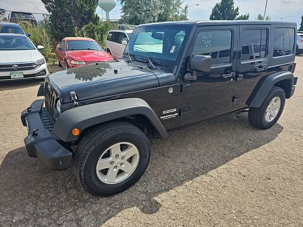 Used 2015 Jeep Wrangler Unlimited Sport with VIN 1C4BJWDG0FL509481 for sale in Thornton, CO