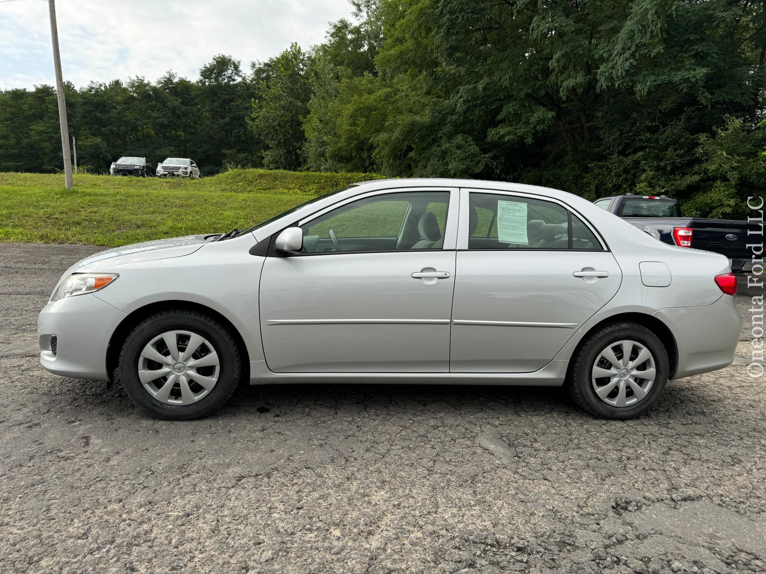 Used 2010 Toyota Corolla LE with VIN JTDBU4EE6AJ071661 for sale in Oneonta, NY