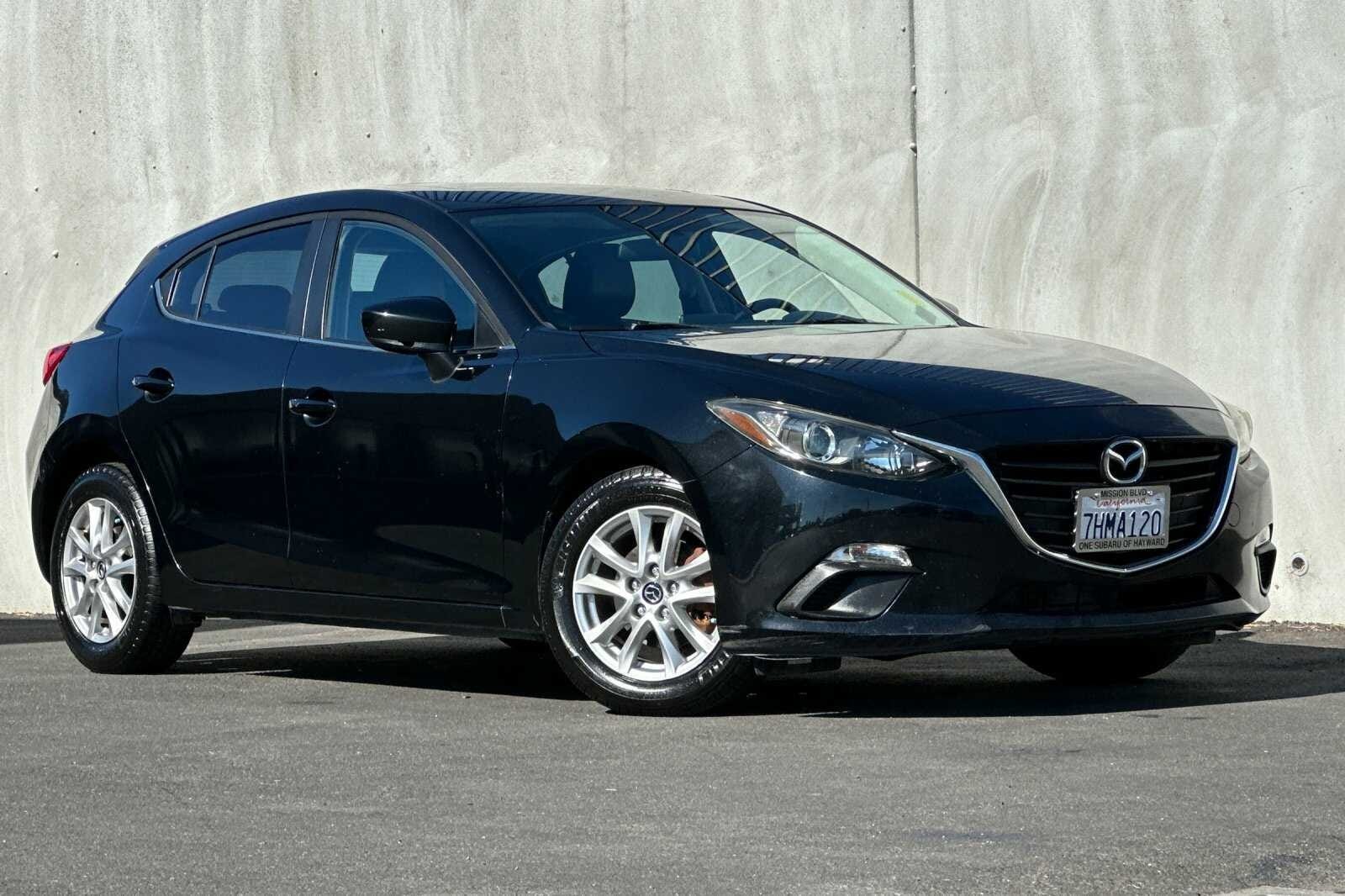 Used 2014 Mazda MAZDA3 i Grand Touring with VIN JM1BM1M74E1164881 for sale in Hayward, CA