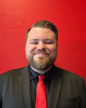 Staff member Nicholas Dame from b6dc09455065