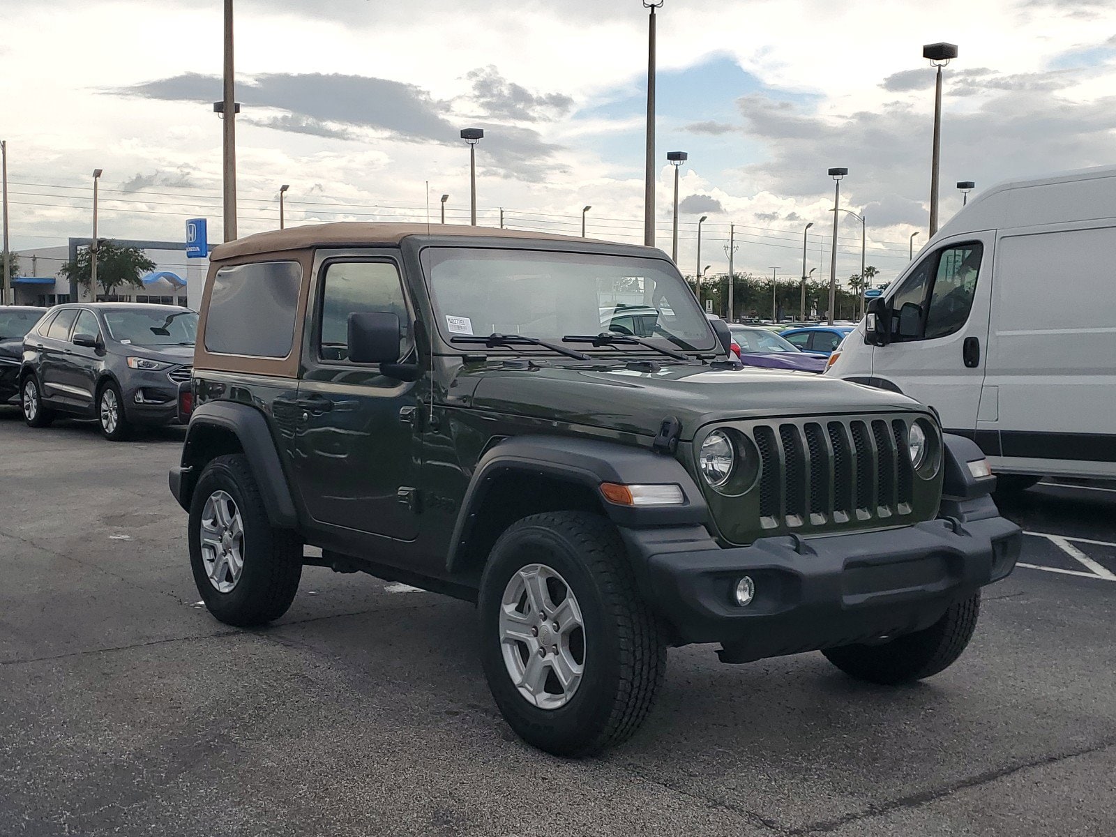 Used 2021 Jeep Wrangler Sport S with VIN 1C4GJXAN7MW827351 for sale in Orlando, FL