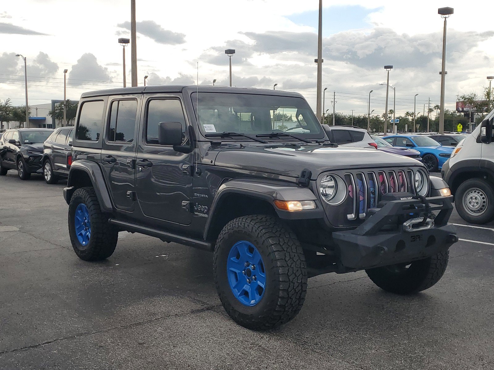 Used 2022 Jeep Wrangler Unlimited Sahara with VIN 1C4HJXEN9NW194643 for sale in Orlando, FL