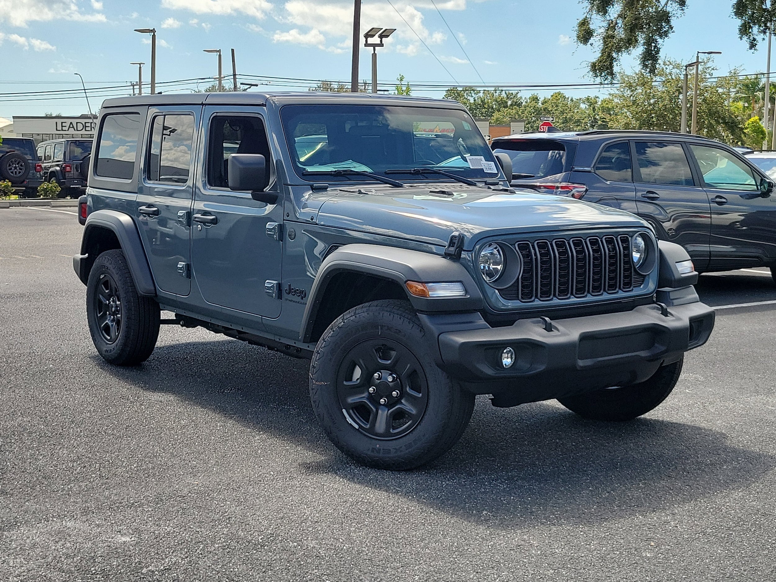 2026 Jeep Wrangler 4-Door Sport's photo