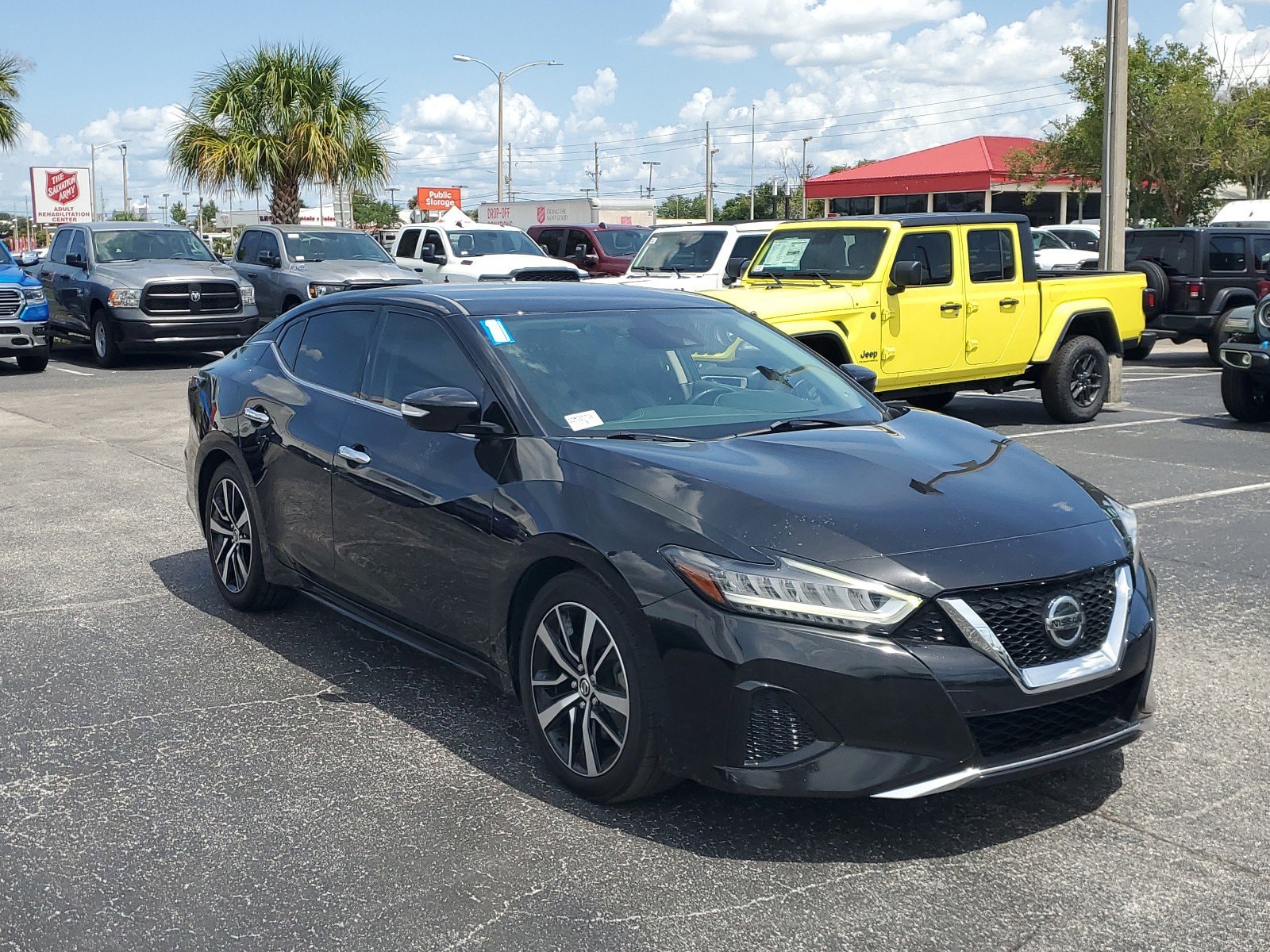 Used 2021 Nissan Maxima SV with VIN 1N4AA6CV2MC507097 for sale in Orlando, FL