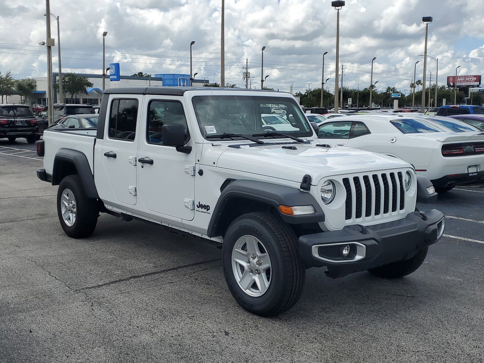 Used 2023 Jeep Gladiator Sport S with VIN 1C6HJTAG4PL514303 for sale in Orlando, FL