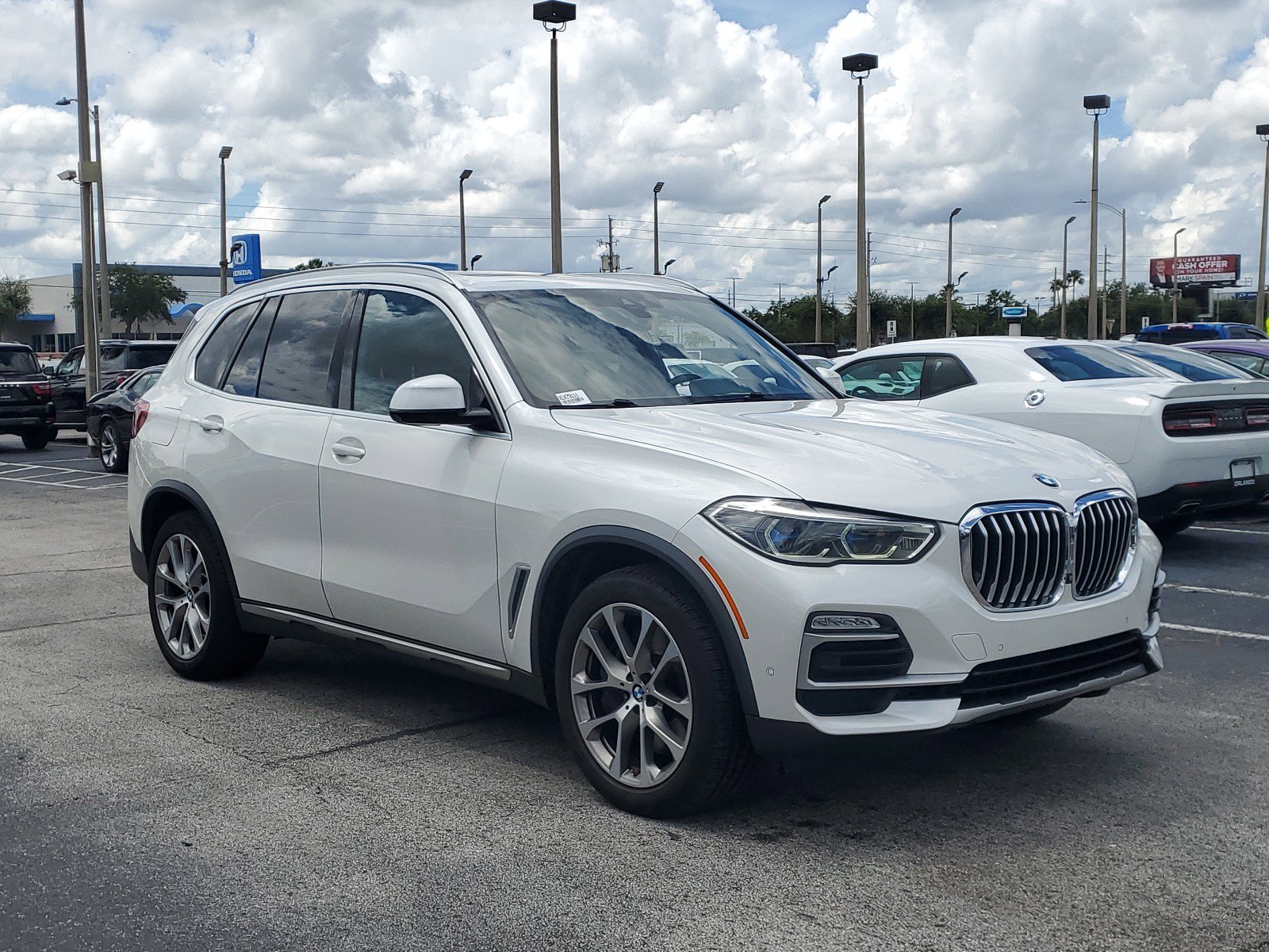 Used 2019 BMW X5 40i with VIN 5UXCR6C52KLK79111 for sale in Orlando, FL