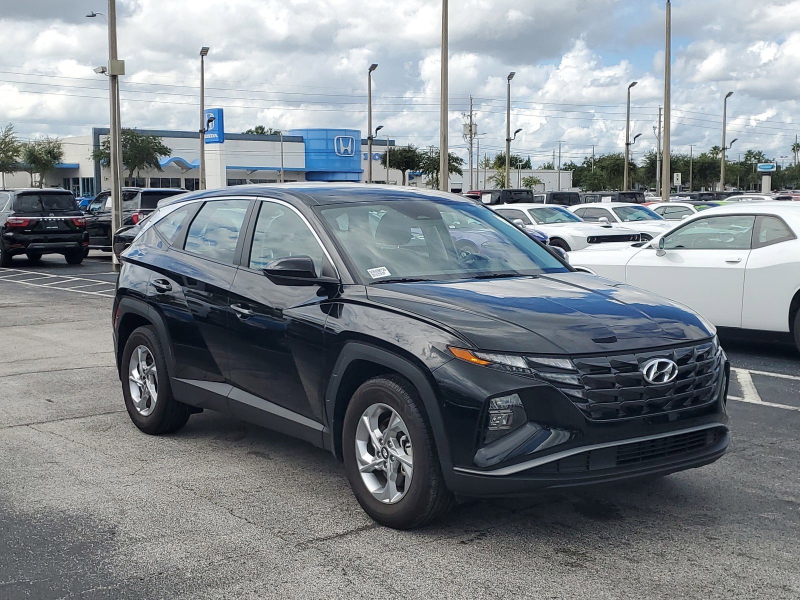 Used 2024 Hyundai Tucson SE with VIN 5NMJA3DE0RH296725 for sale in Orlando, FL