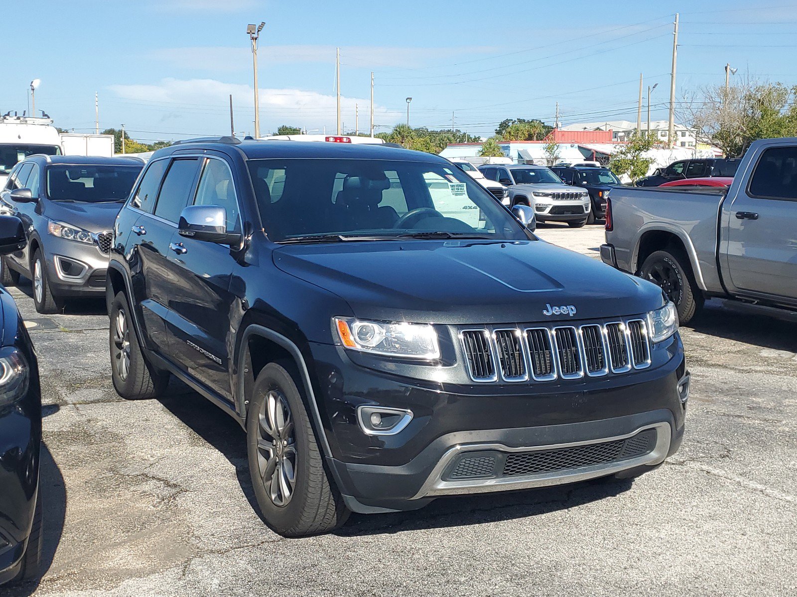 Used 2014 Jeep Grand Cherokee Limited with VIN 1C4RJFBG7EC415730 for sale in Orlando, FL