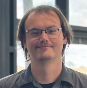 Staff member Christopher from ID_ea37fb51bfc3