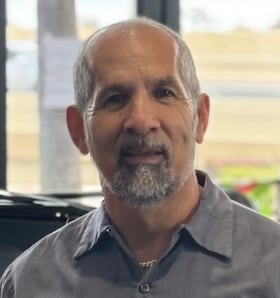 Staff member Fredy from ID_ea37fb51bfc3