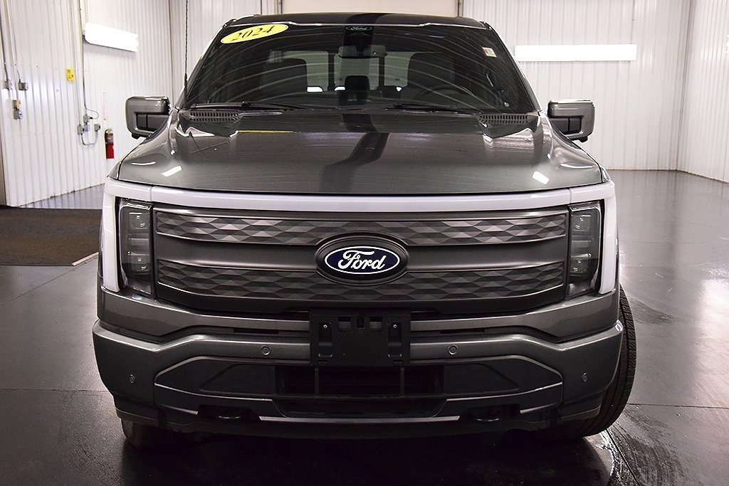 Used 2024 Ford F-150 Lightning Lariat with VIN 1FT6W5L72RWG03038 for sale in Medina, NY
