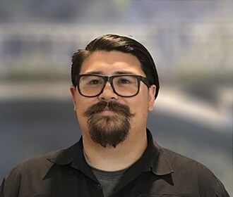 Staff member Tyler Le from efec3ac37d51