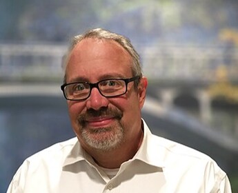 Staff member Greg Simons from 52cb008c3271