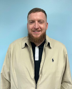 Staff member Zack Young from ce665fcc59f3