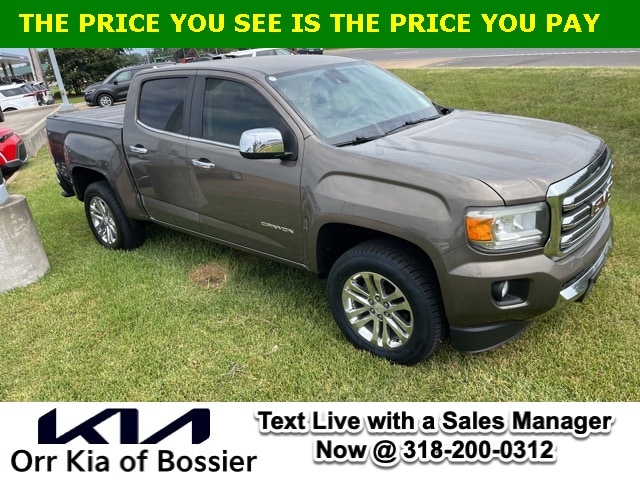 Used 2015 GMC Canyon SLT with VIN 1GTG5CE34F1211662 for sale in Bossier City, LA