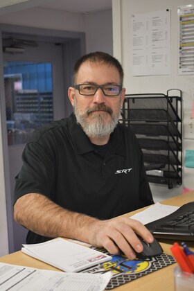 Staff member John Riley from ID_fef496c37ec6