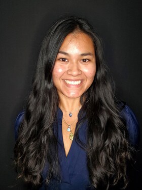 Staff member Lilly T. from ID_682160