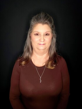 Staff member Connie P. from ID_04f884