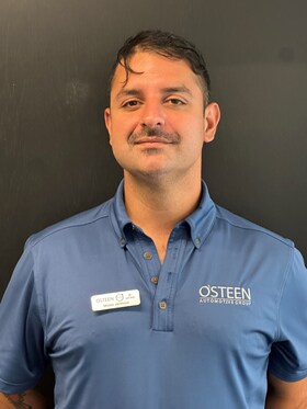 Staff member Moses J. from ID_682160