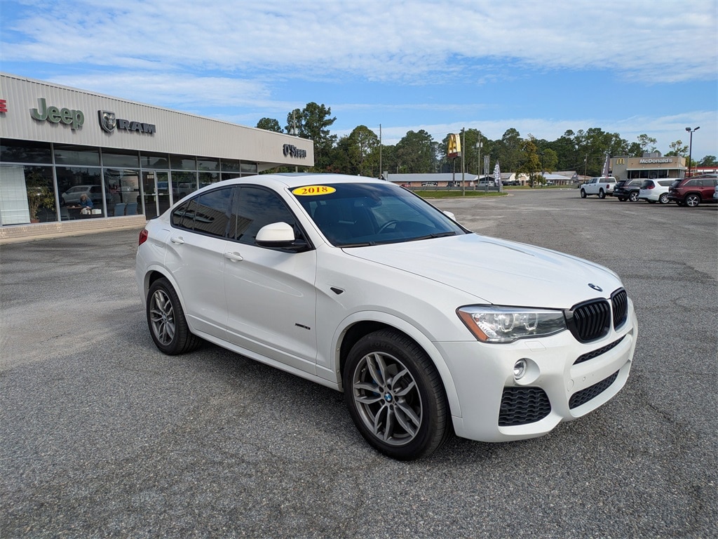 Used 2018 BMW X4 xDrive28i with VIN 5UXXW3C51J0T82996 for sale in Nashville, GA