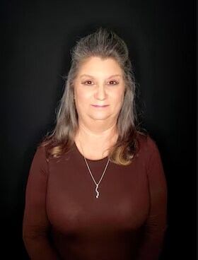 Staff member Connie P. from ID_e19d47