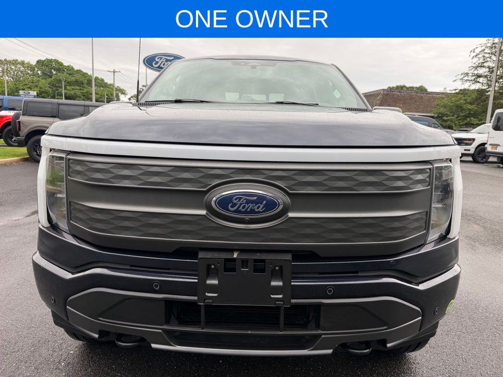 Certified 2022 Ford F-150 Lightning Lariat with VIN 1FTVW1EL1NWG15352 for sale in Quogue, NY
