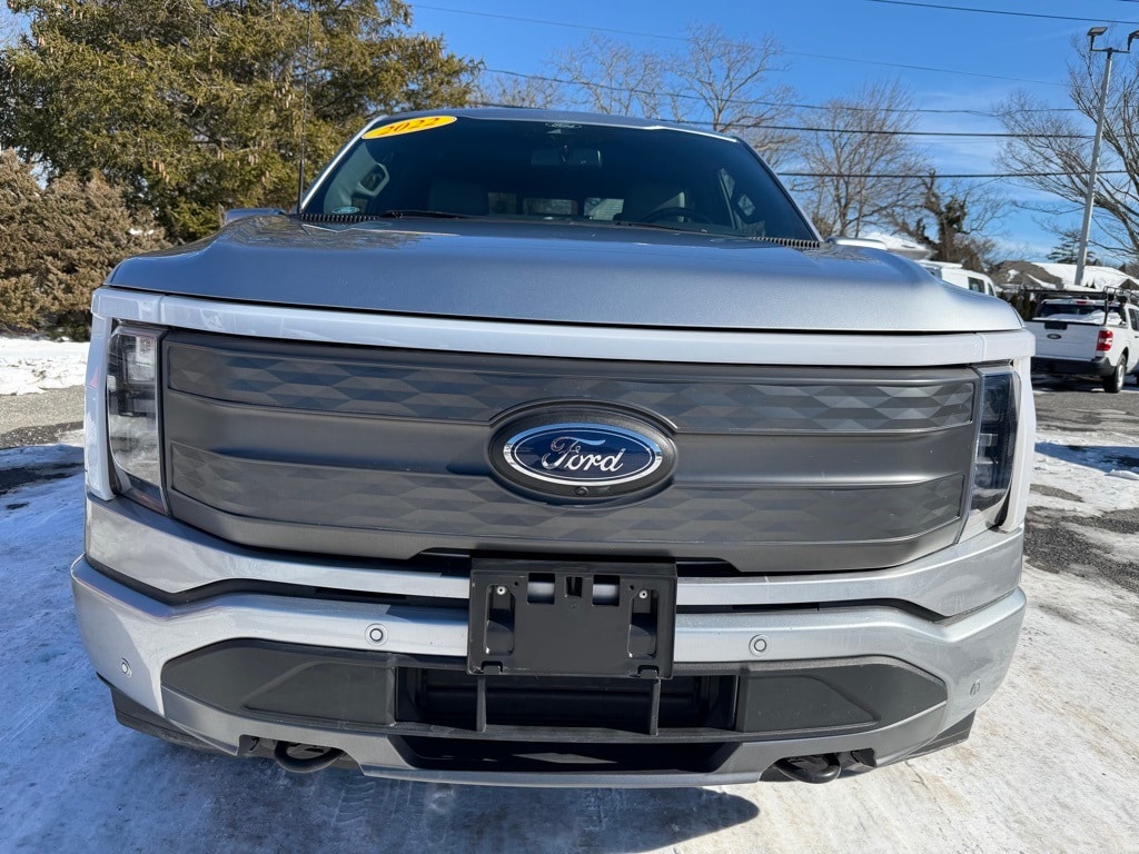 Certified 2022 Ford F-150 Lightning Lariat with VIN 1FTVW1EL5NWG14706 for sale in Quogue, NY