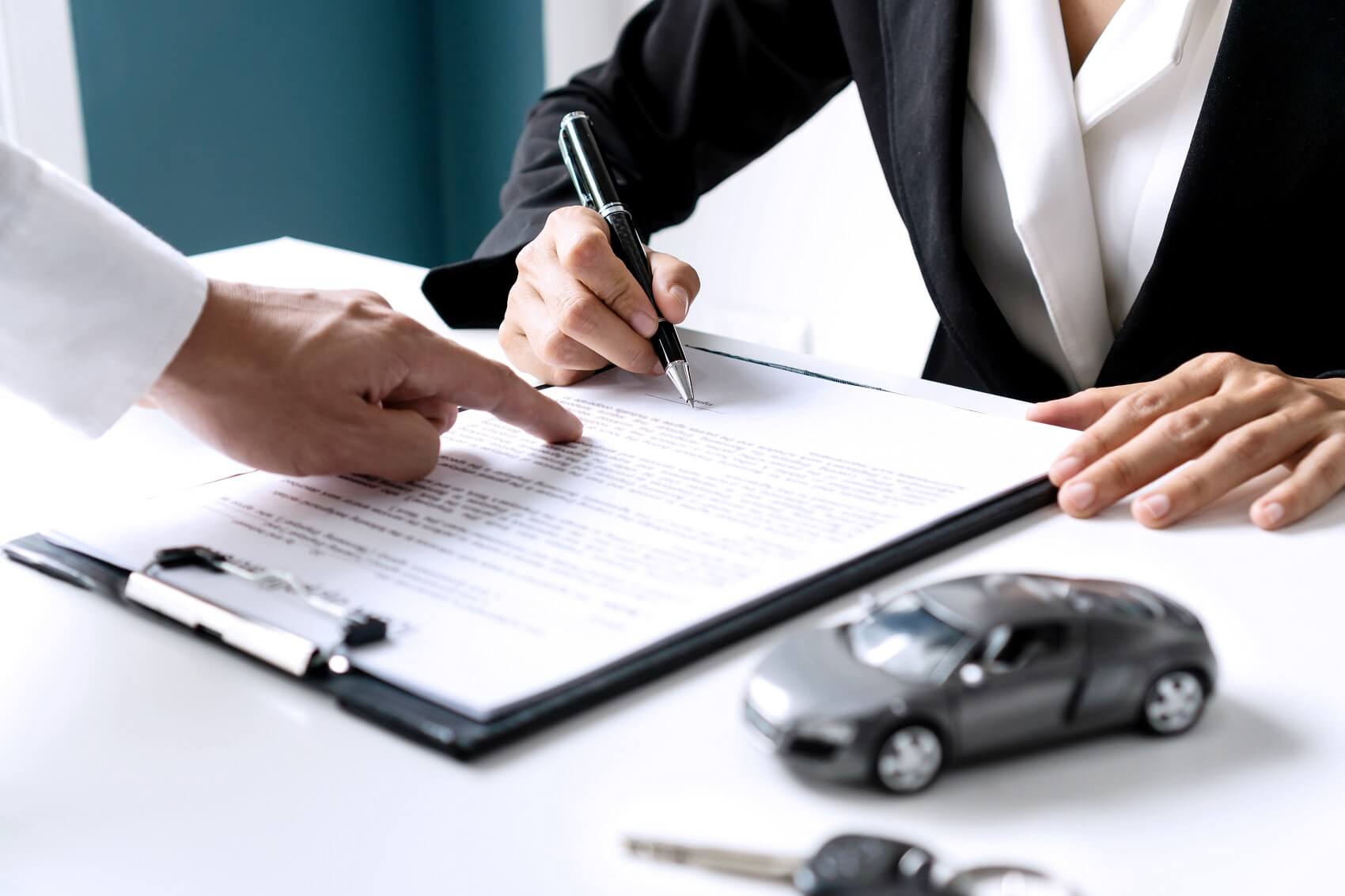 Signing a financing paper