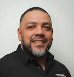Staff member Luis Minaya from ID_13a16c