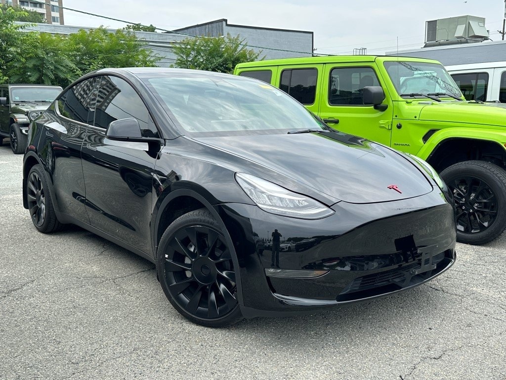 Used 2023 Tesla Model Y Long Range with VIN 7SAYGDEEXPA040107 for sale in Northfield, Minnesota