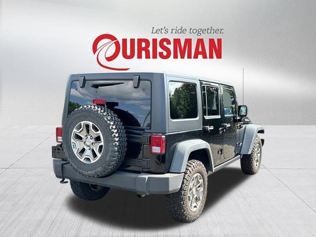 Used 2014 Jeep Wrangler Unlimited Rubicon with VIN 1C4HJWFG7EL158414 for sale in Chantilly, VA