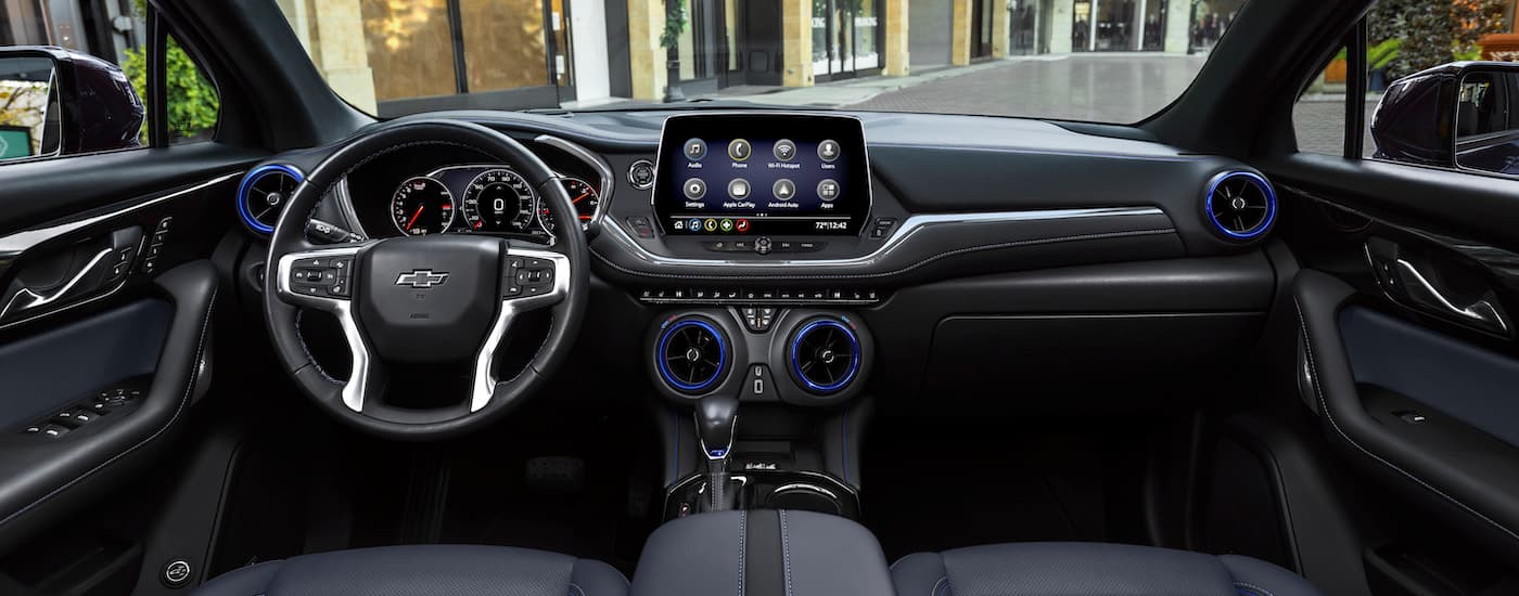The black interior of a 2024 Chevy Blazer is shown from above the center console.