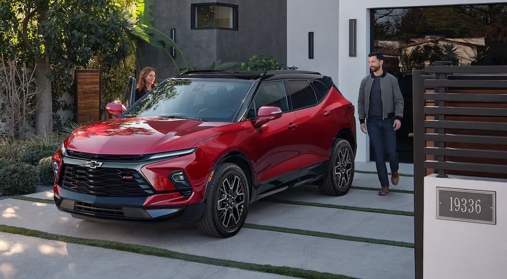 2024%20Chevy%20Blazer%20RS%20-%2019336.jpg A red 2024 Chevy Blazer RS is shown parked on a driveway after viewing a Chevy Blazer for sale.
